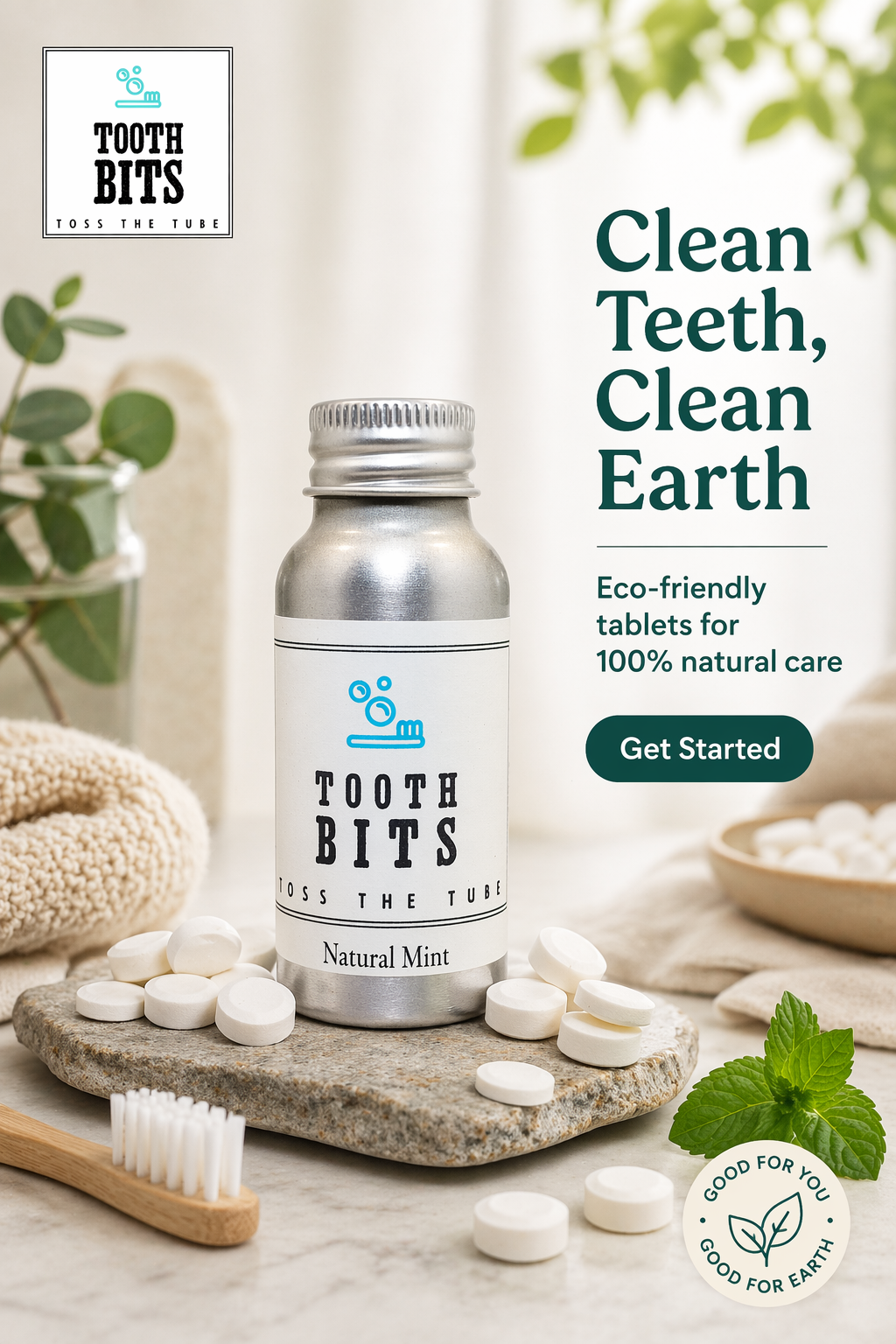 A silver metal bottle of Tooth Bits natural mint tablets stands on a stone slab with white tablets scattered around it. The scene includes a bamboo toothbrush, a folded towel, green leaves, and promotional text reading 'Clean Teeth, Clean Earth' and 'Eco-friendly tablets for 100% natural care.