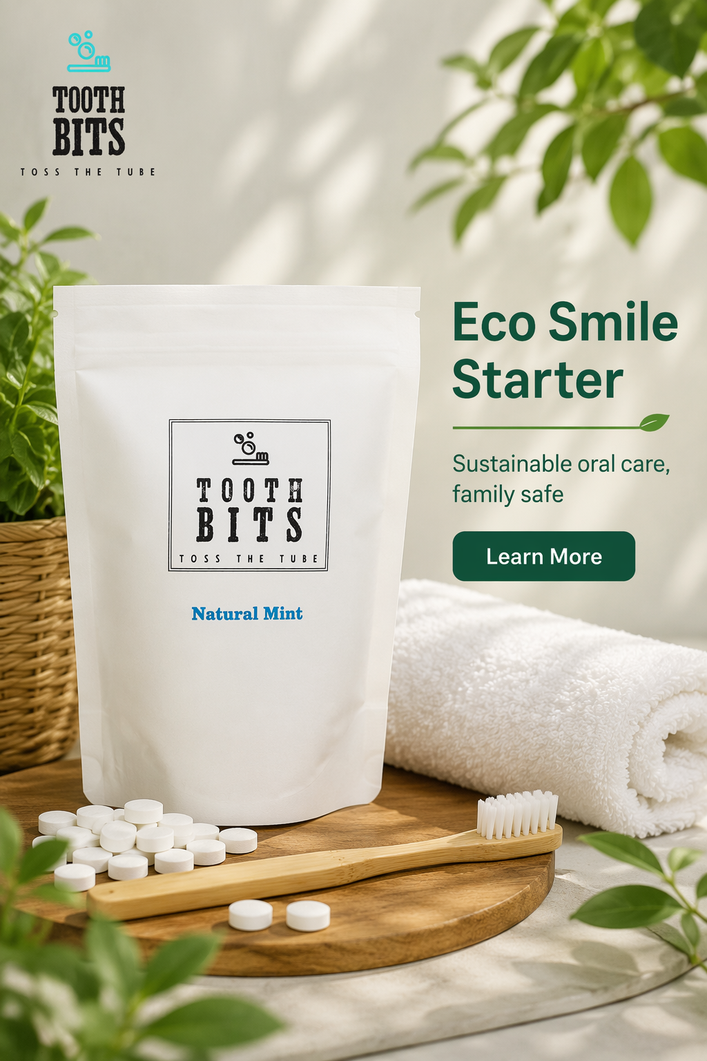 A white stand-up pouch of Tooth Bits eco-friendly oral care tablets in Natural Mint flavor, displayed on a wooden tray with tablets, a bamboo toothbrush, and a white towel. The background is a soft beige with green leaves, featuring promotional text for 'Eco Smile Starter'.