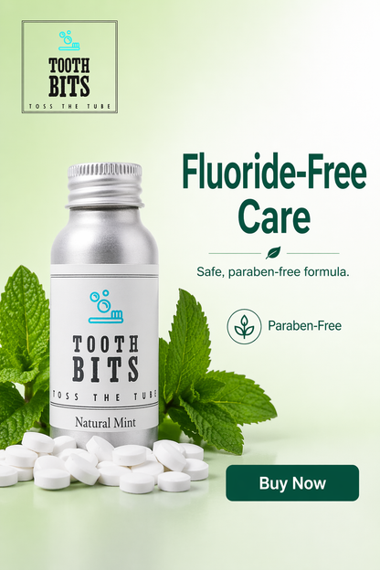 Tooth Bits fluoride-free care natural mint oral care bottle with white tablets and mint leaves on a light green background with promotional text.